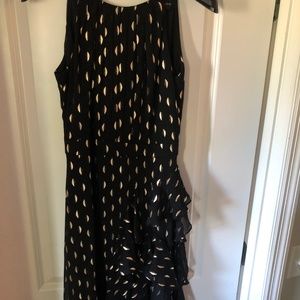 Woman’s Formal long black and gold gown size 4 By Betsy Adam